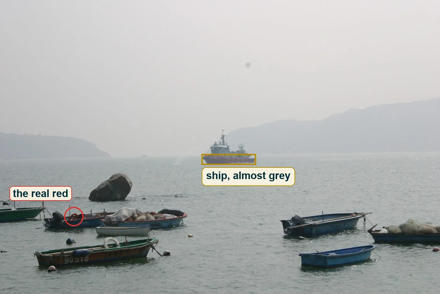 Full photo with a box on the ship's hull and a circle on a red lifebuoy in the foreground