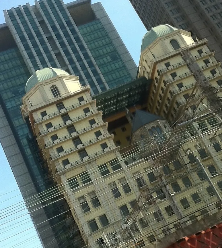 Tight crop of the two domes with wires running below them