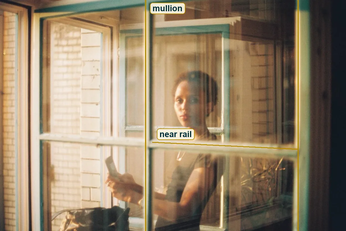 The full photo with the window mullions and the rail traced as lines