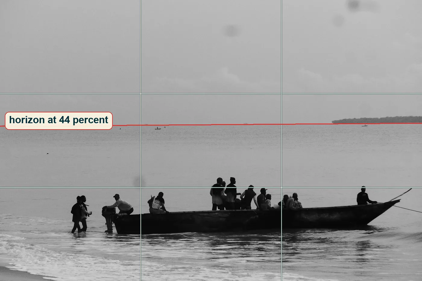 Full photo with a thirds grid and the horizon line marked just above the middle