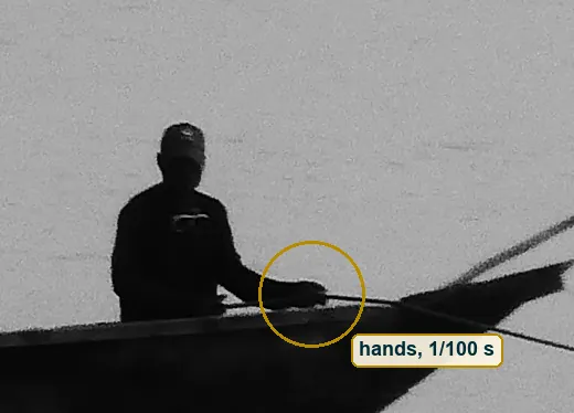 Close crop of the bow man's hands on the rope